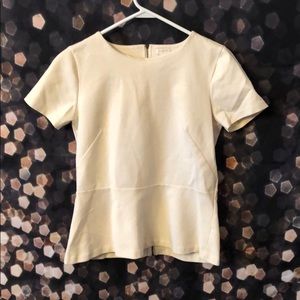 Zipper back, flair bottom cream shirt